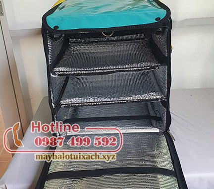 San xuat tui giu nhiet giao hang Xanh SM